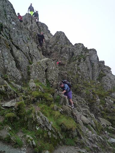 13_27-1.jpg - Dave and Sue descending from the steep drop off Striding Edge